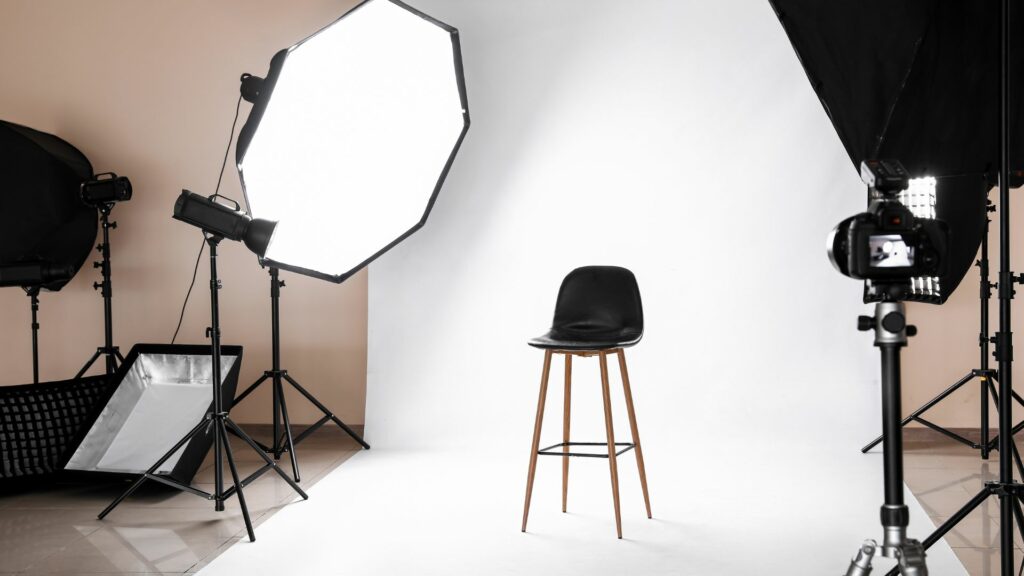 photo studio lighting camera on a white backdrop